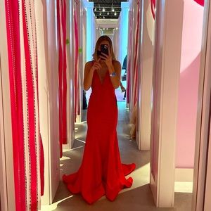 Prom dress worn one time, perfect shape nothing wrong with it. Beautiful dress!